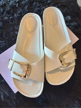 Madden Girl Off- White Slide Sandals with Gold Buckle Accent